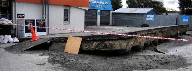 After the 2010 earthquake near Christchurch, New Zealand, liquefaction occurred throughout the city, including at this gas station. (Image courtesy of Martin Luff) 