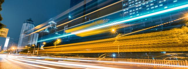 Traffic speeding by at night