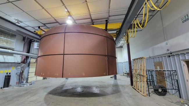 The dome shape of the tornado simulator is designed to reduce energy loss as the system operates. (Photograph courtesy of Guirong (Grace) Yan)