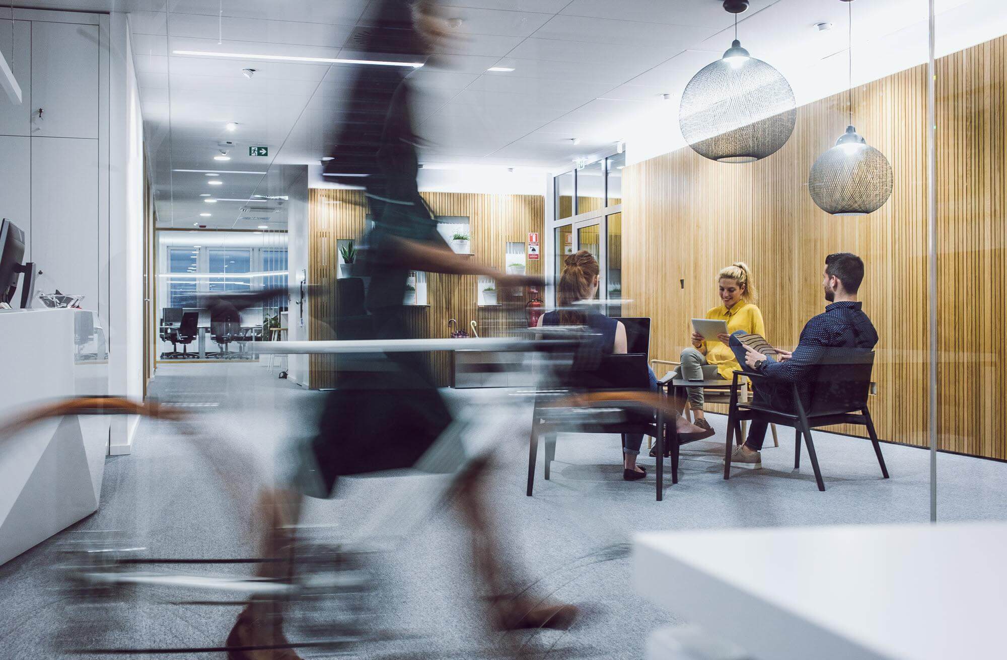 graphic of woman walking through an office