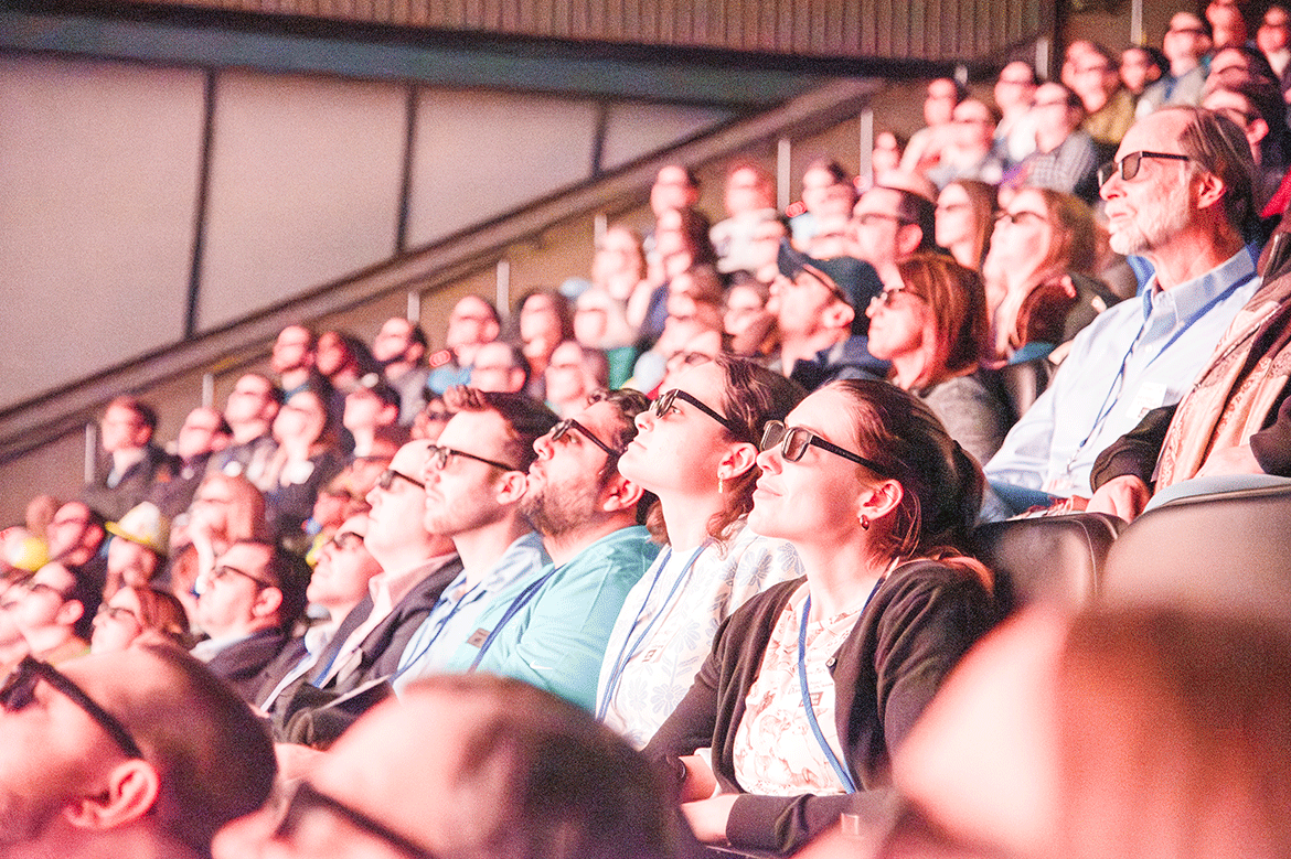 People enjoying a movie in a theater